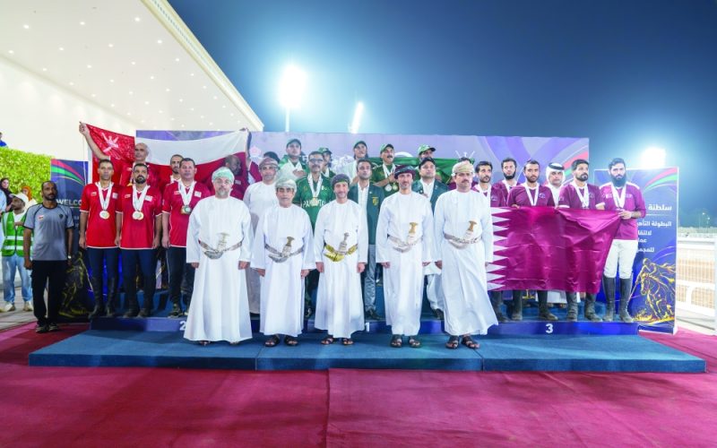 The podium winners celebrate their achievements after the final round. — Asaad al Badri